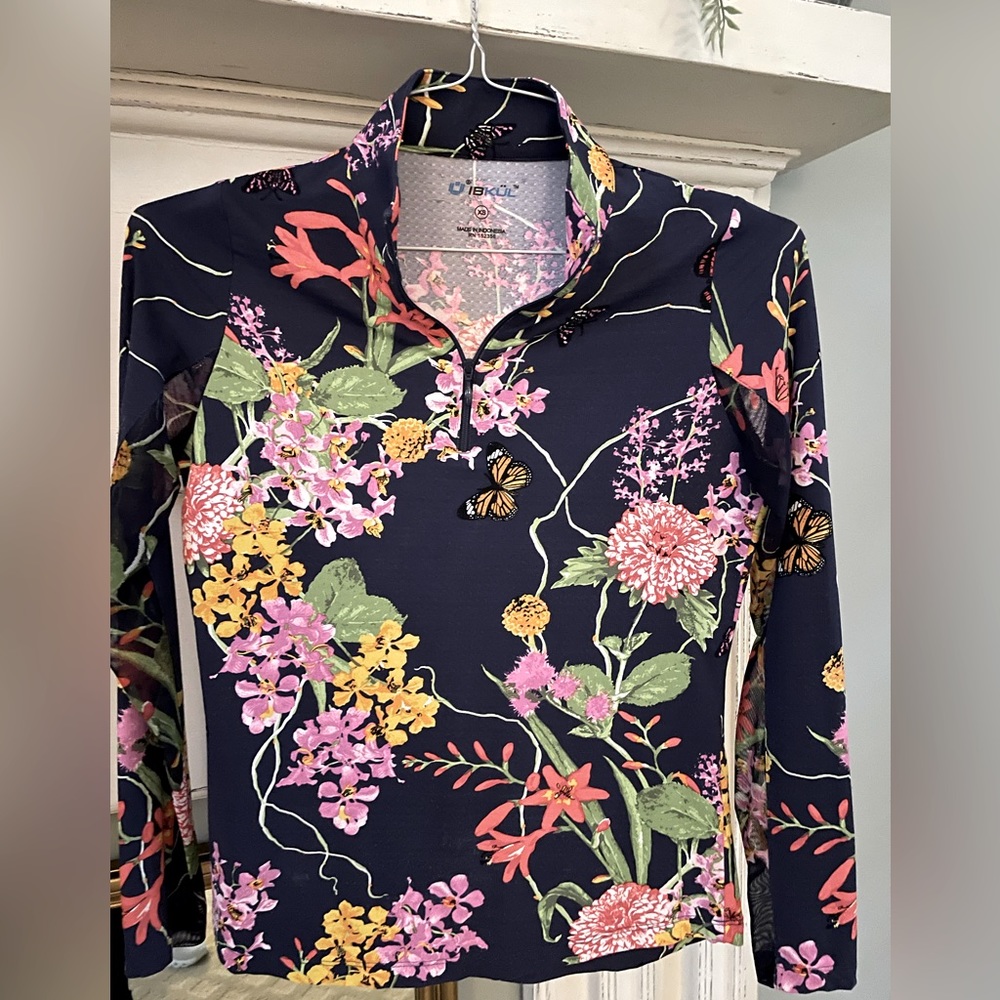 Ladies long sleeve Golf or Riding shirt.  Vented SPF 50 beautiful floral